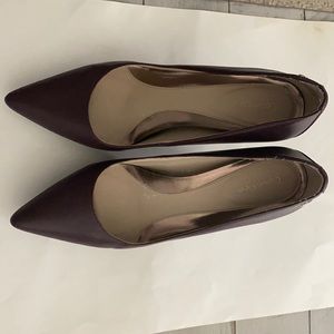 Classy 2in Burgundy Calvin Klein pumps.
